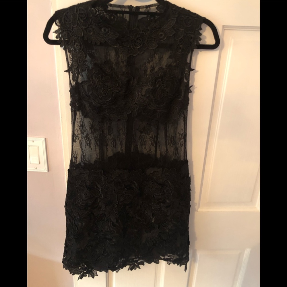 Black lace dress with see through detail and built in bra cups , can be removed